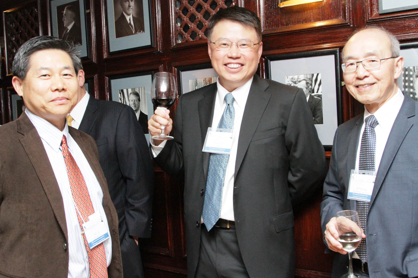 (L to R) Sun Lu from Genecopeia, Dr. Wei Wu He from OriGene, and Dr. Alfred Yung from MD Anderson Cancer Center enjoying the pre-reception cocktail hour