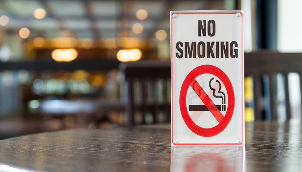 “Why Smoking is Prohibited in Air-Conditioned Rooms: Facts and Safety”